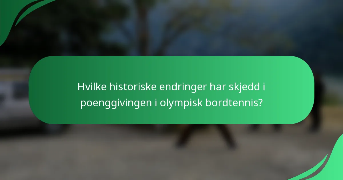 Hvilke historiske endringer har skjedd i poenggivingen i olympisk bordtennis?